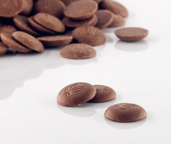 Chocolat - Chocolat au lait 38% de cacao, A consommer de préférence avant le 23.10.2024 - gebana